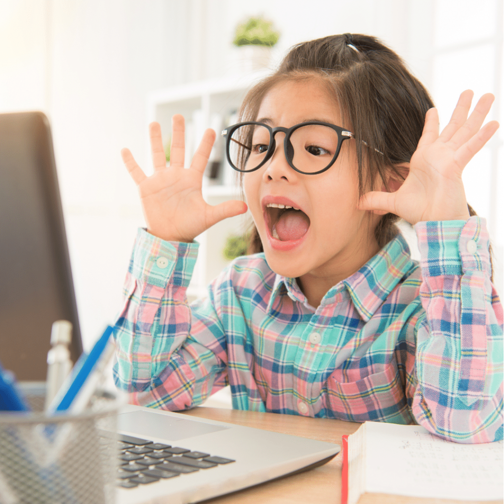 A child speaking to use Google voice typing.